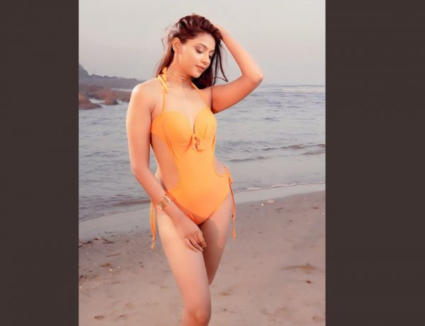 Actor Nikkita Ghag flaunts an orange bikini, says “Colors are not associated with any religion.”