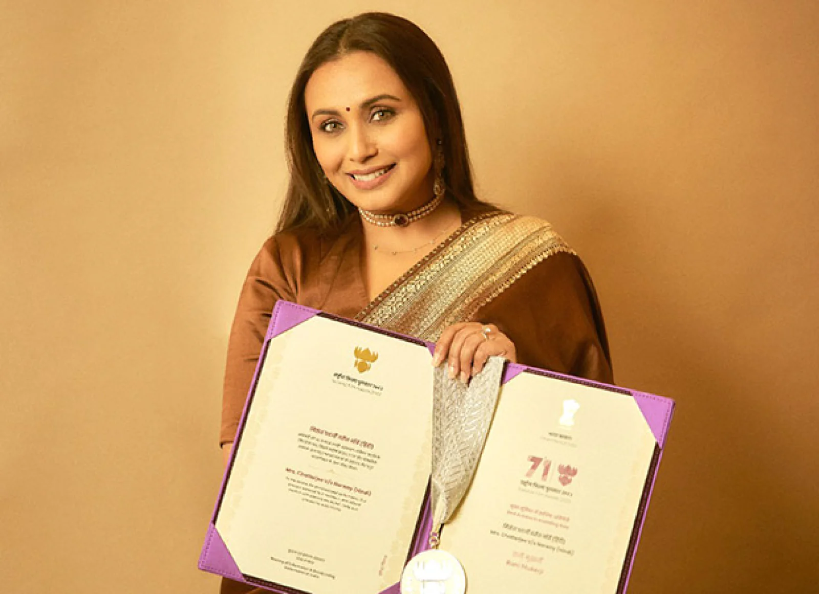  Mukerji reacts after receiving the National Award